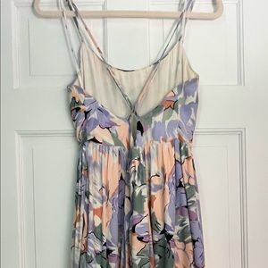 Paint a Picture Ivory Multi Floral Print Sleeveless Maxi Dress
Lulus